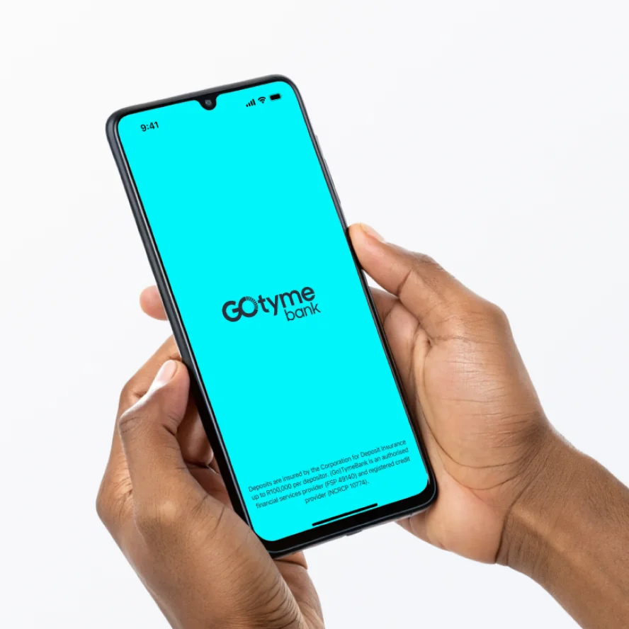 Phone showing GoTyme Bank app