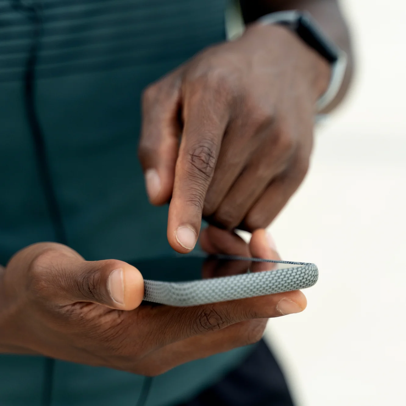 Man using phone to file a report