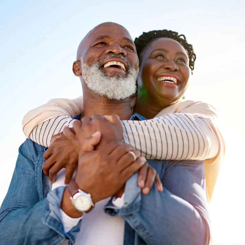 Couple forming a heart hand